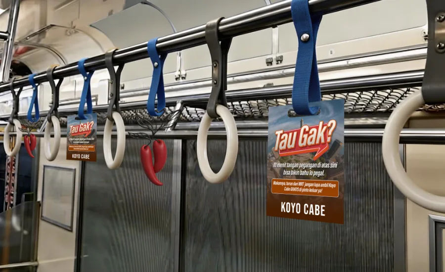 Campaign tags hanging from MRT hand straps