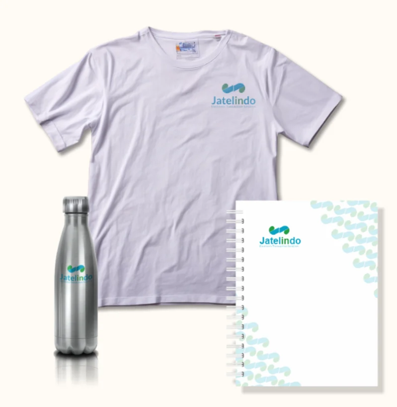 Jatelindo branding on a shirt, a bottle and a notebook