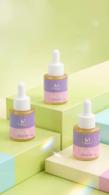Serum bottles on pastel green blocks