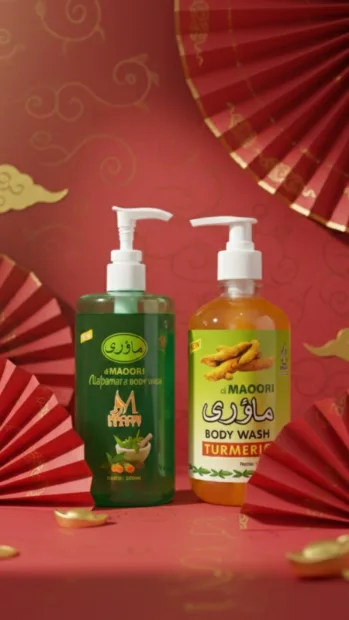 Two body wash bottles against a red festive backdrop